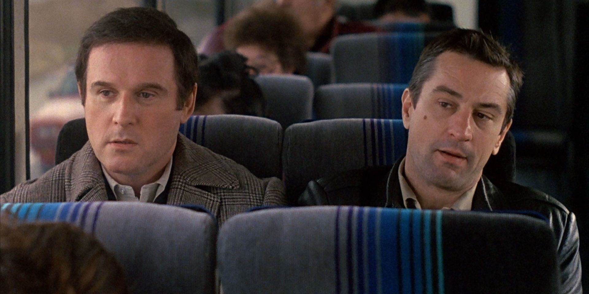 Robert De Niro and Charles Grodin on a bus in Midnight Run