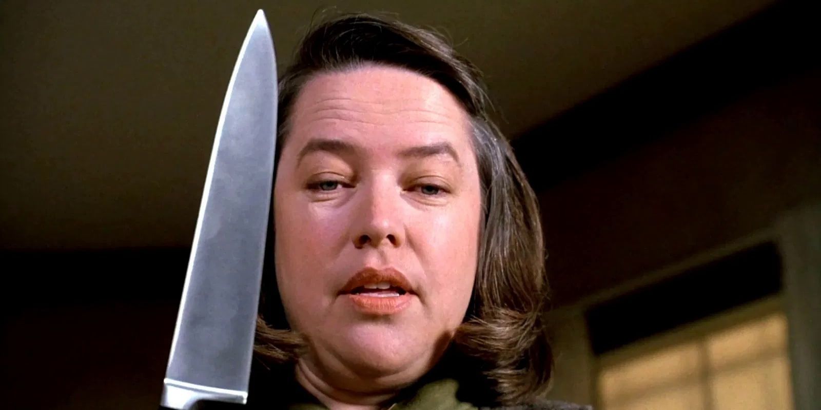 Annie Wilkes holding a knife in Misery.
