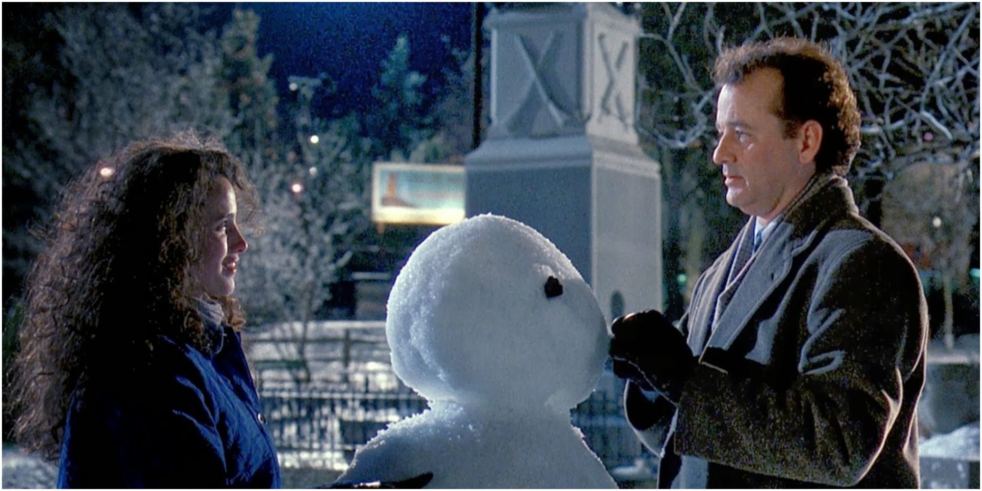 Bill Murray and Andiw MacDowell make a snowman in Groundhog Day.