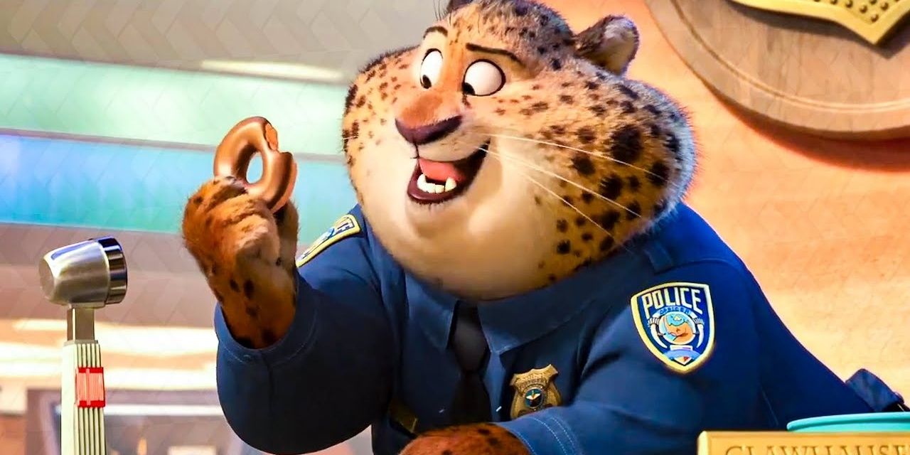 Officer Clawhauser looking at a donut and smiling