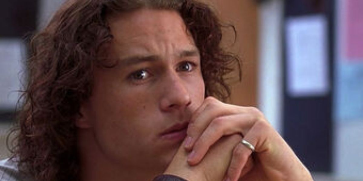Patrick holding his hands up in 10 Things I Hate About You
