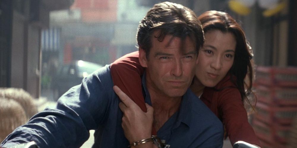 Pierce Brosnan and Michelle Yeoh on a motorcycle in Tomorrow Never Dies