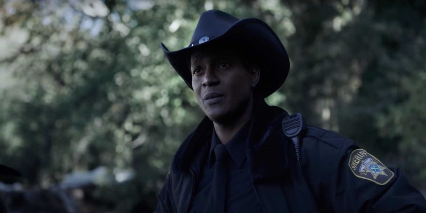 Corey Reynolds as Sheriff Mike Thompson in Resident Alien on SyFy