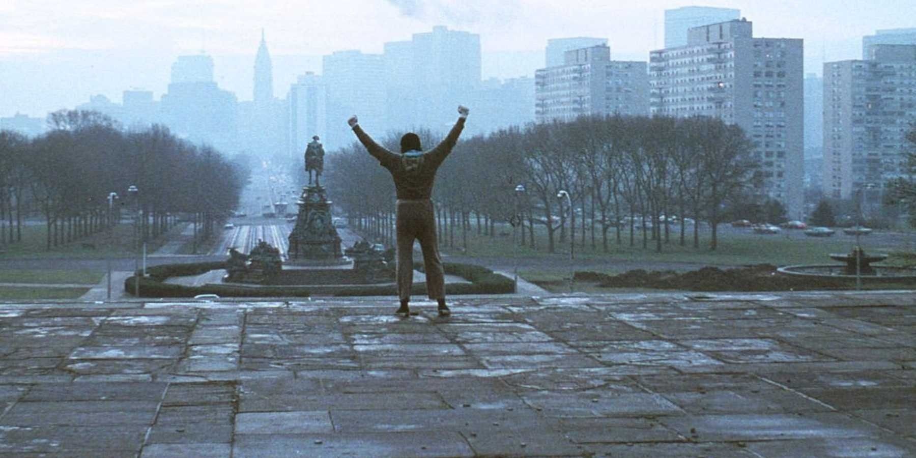 Sylvester Stallone poses for selfie at top of Rocky steps