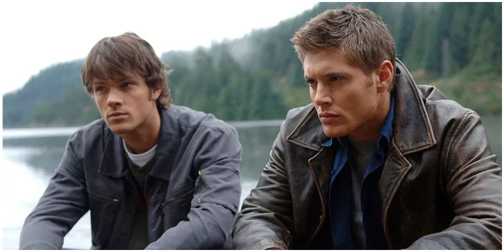 Dean and Sam look out into the possibly haunted lake in Supernatural dead in the water