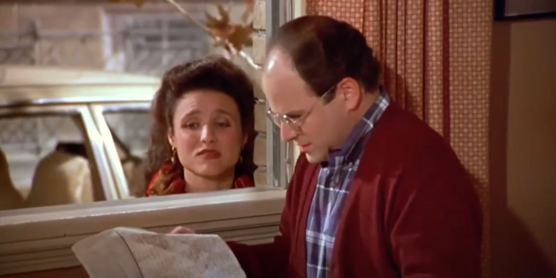 Elaine gives George a filled out IQ test in Seinfeld