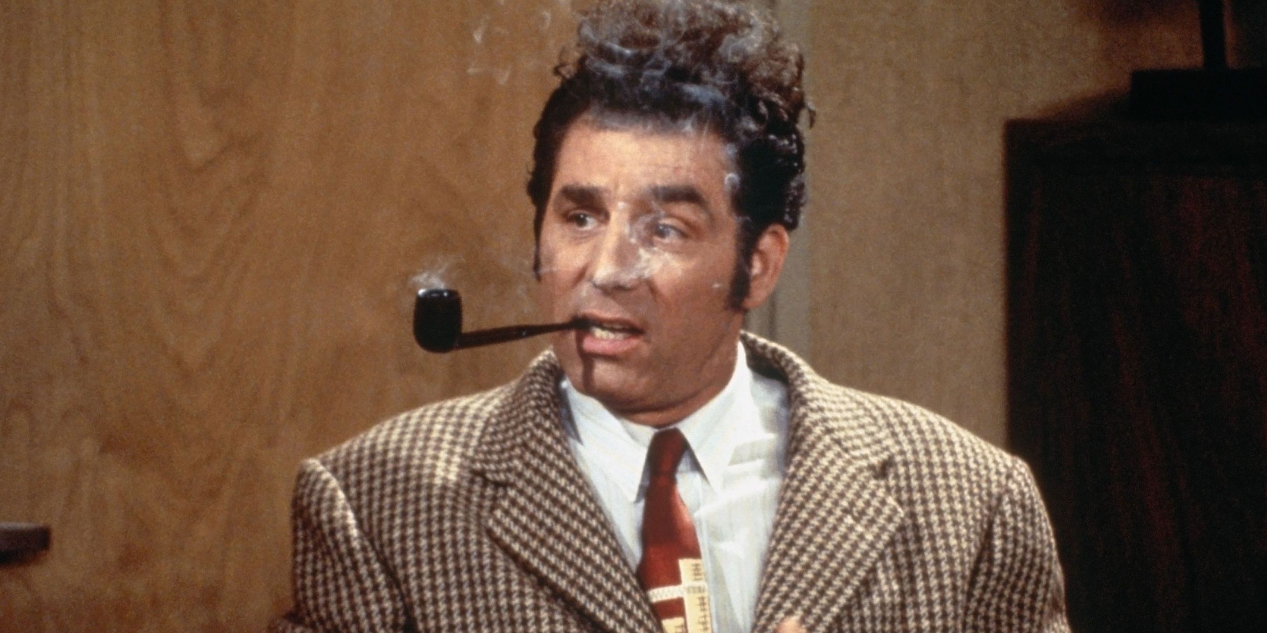 Kramer smokes a pipe in Seinfeld