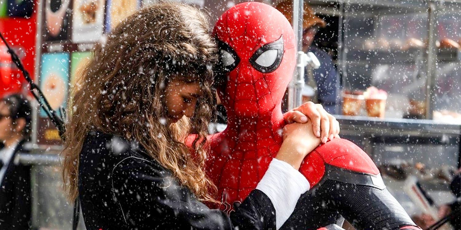 MJ holds onto Spider-Man in the snow