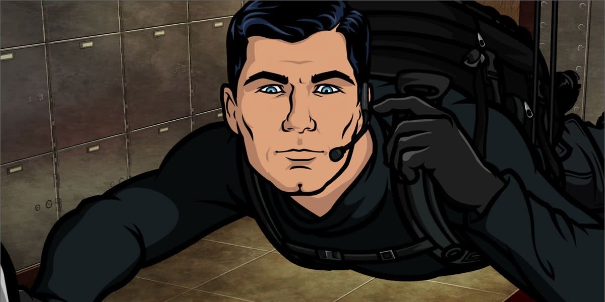 Sterling Archer in a black spy suit