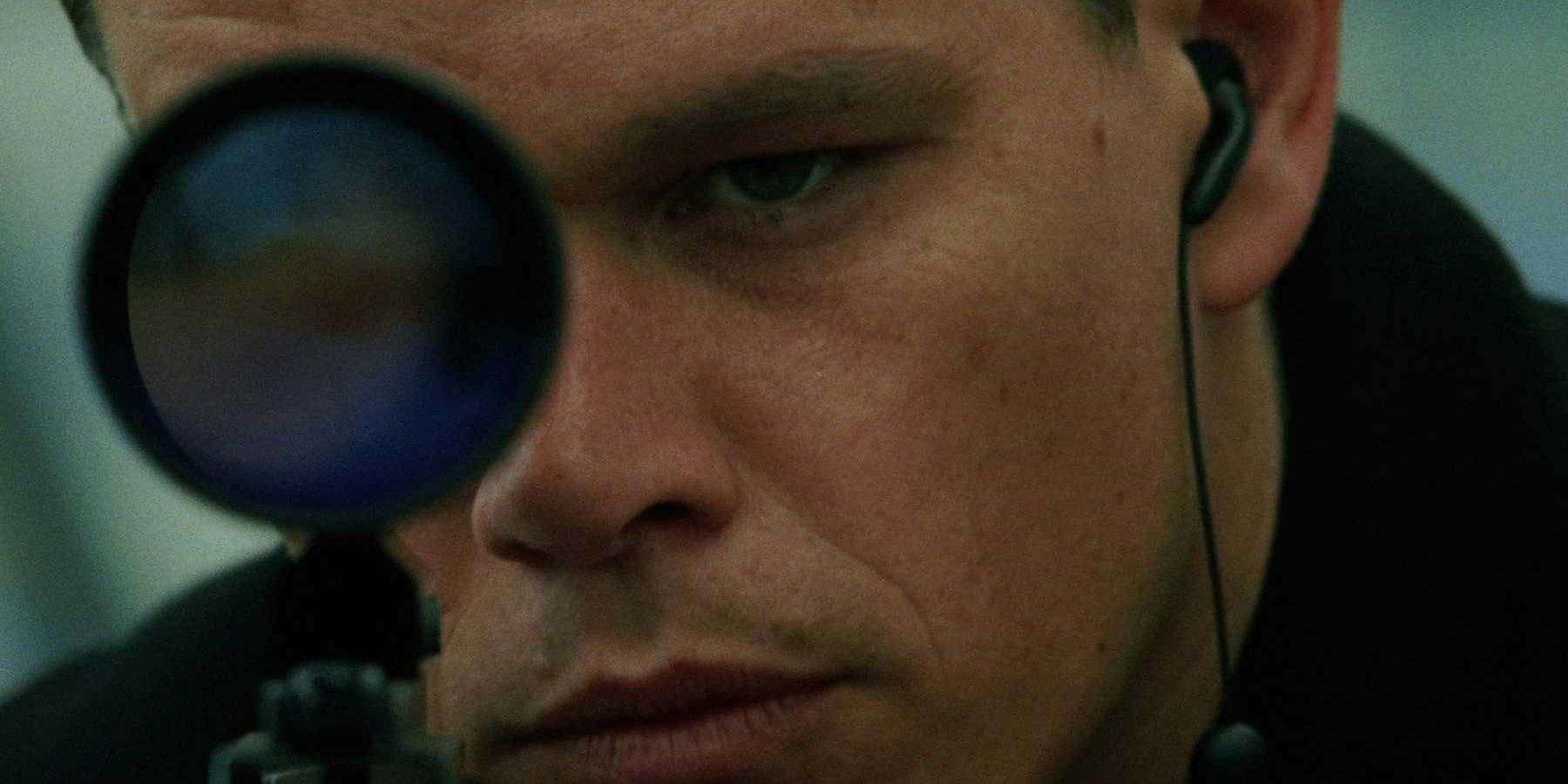 Jason Bourne aiming a gun.