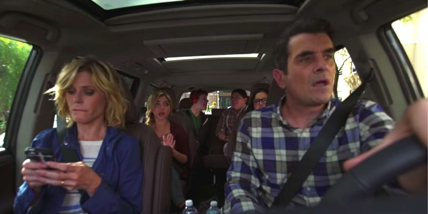 The Dunphy family in the car in Modern Family