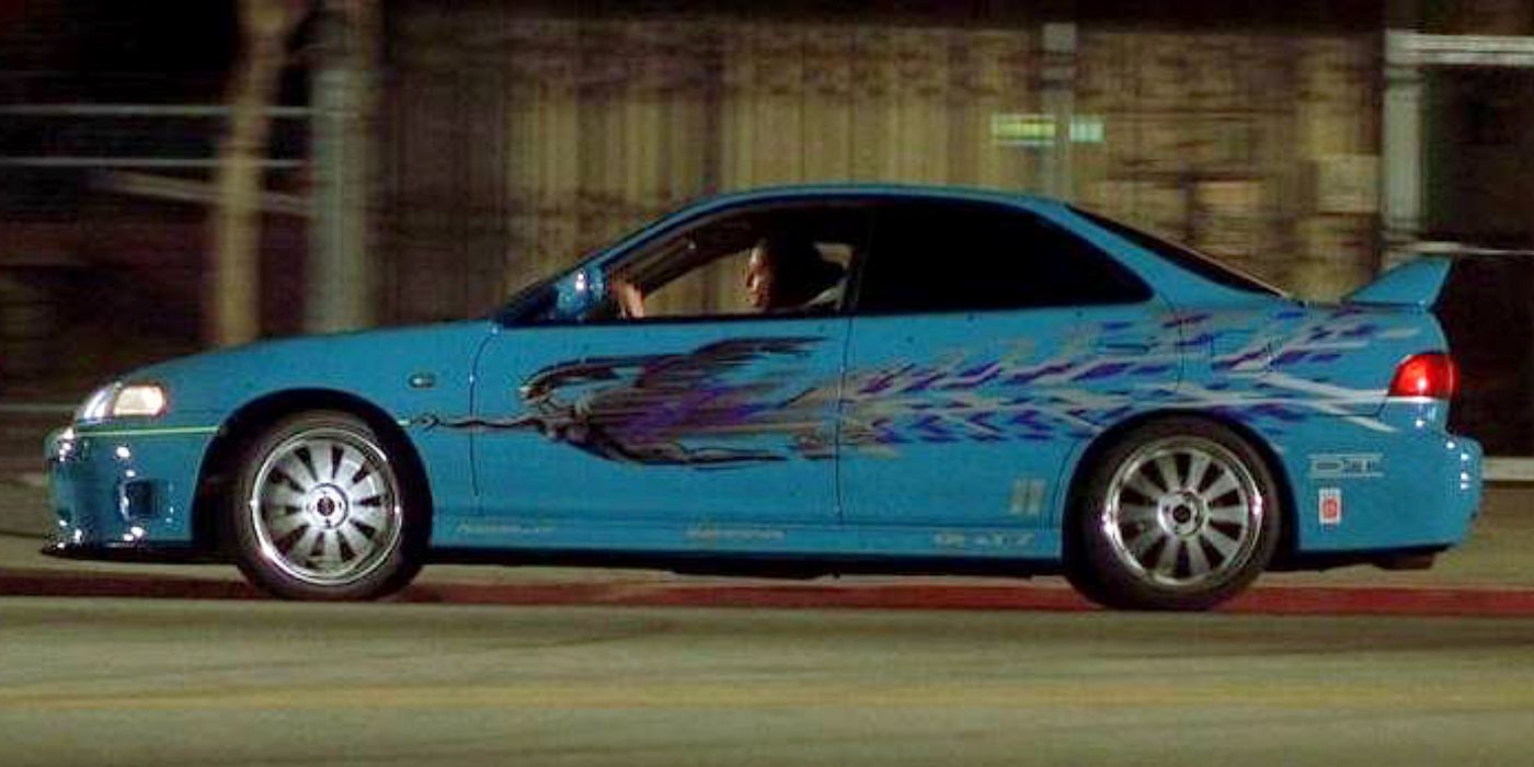 Mia Toretto (Jordana Brewster) driving the blue 1994 Acura Integra in The Fast and the Furious