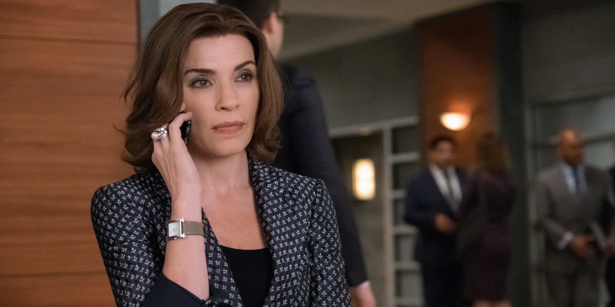 Alicia talks on the phone in The Good Wife