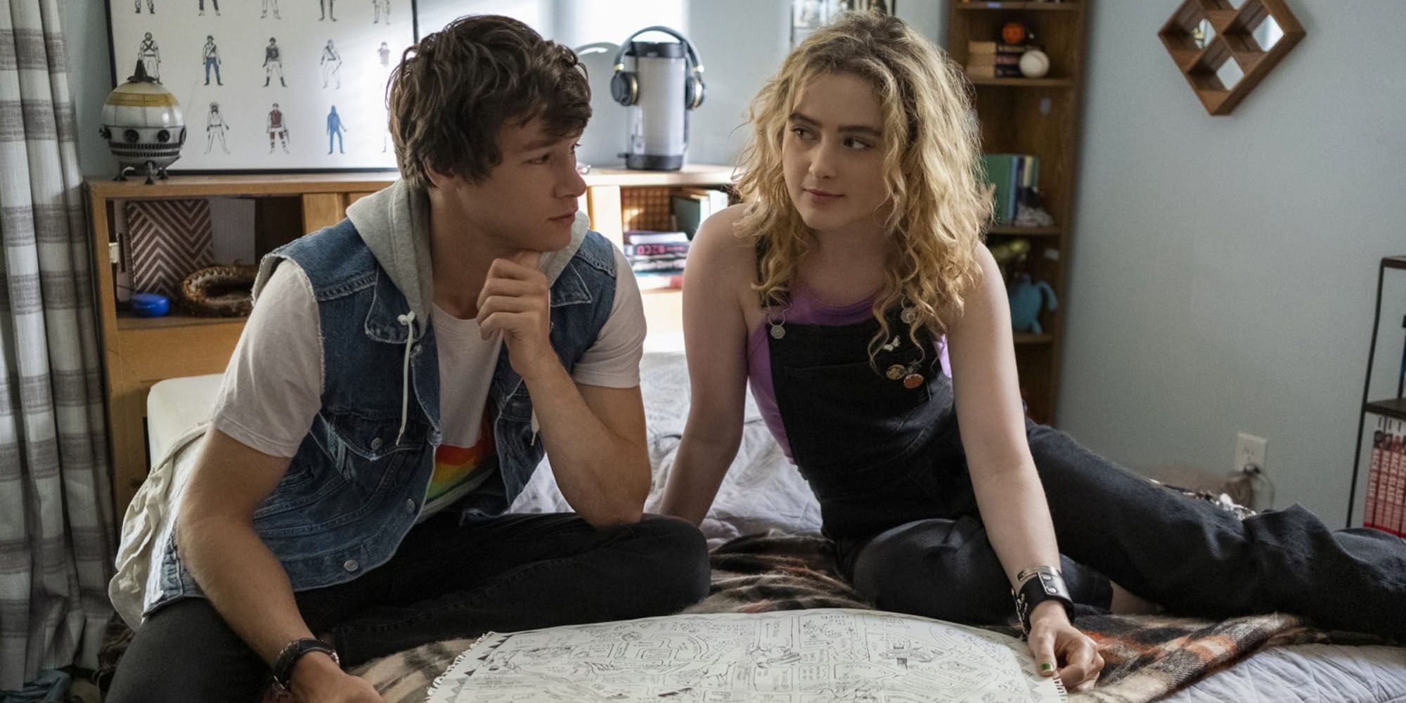 Kathryn Newton and Kyle Allen set on a bed together in The Map of Tiny Perfect Things