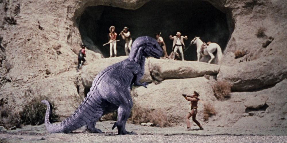 People fighting off an Allosaurus in The Valley of Gwangi
