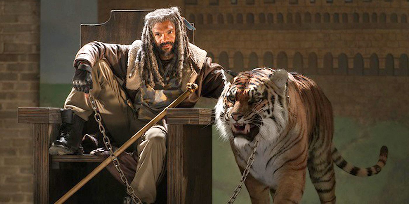 Shiva from The Walking Dead, right by Ezekiel's side on his throne.