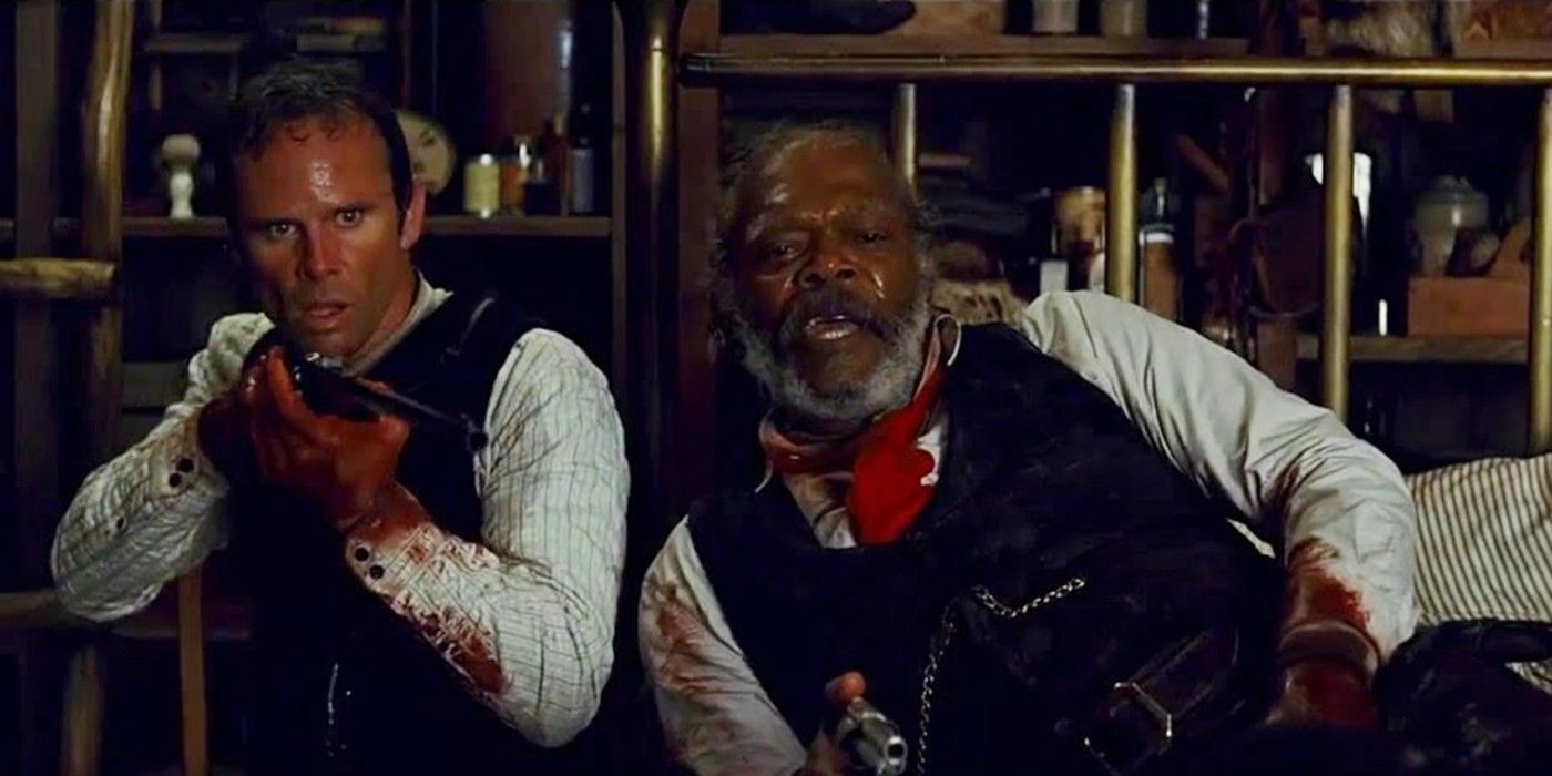 Major Warren and Chris Mannix covered in blood at the end of The Hateful Eight