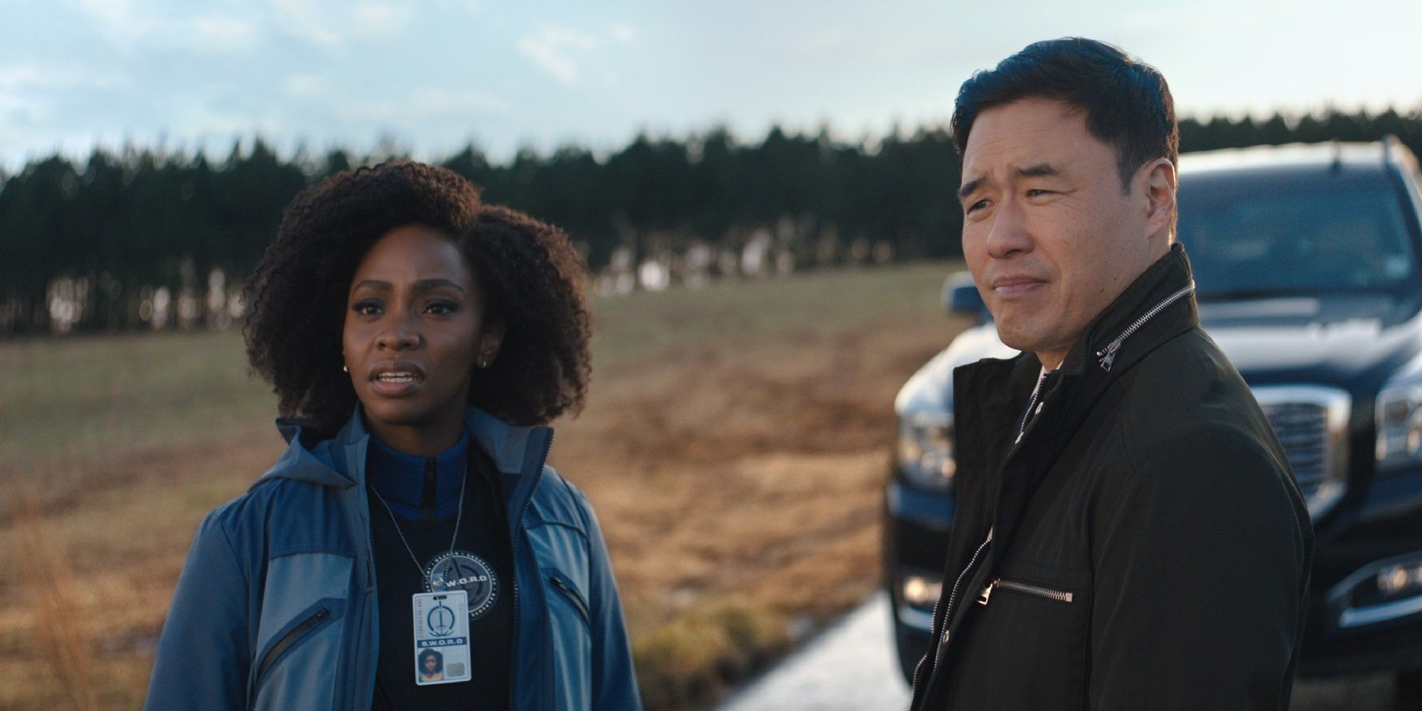 Teyonah Parris and Randall Park investigate outside of Westview in WandaVision