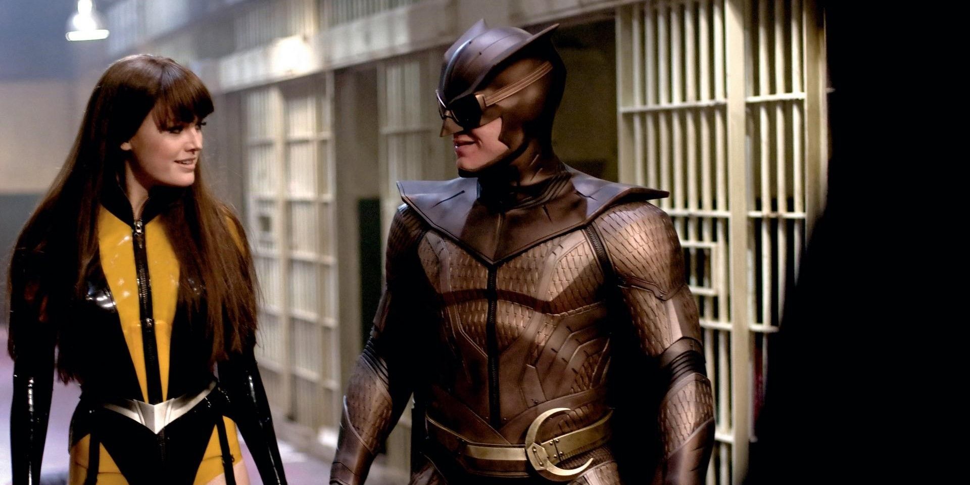 Nite Owl and Silk Spectre smile at each other in Watchmen