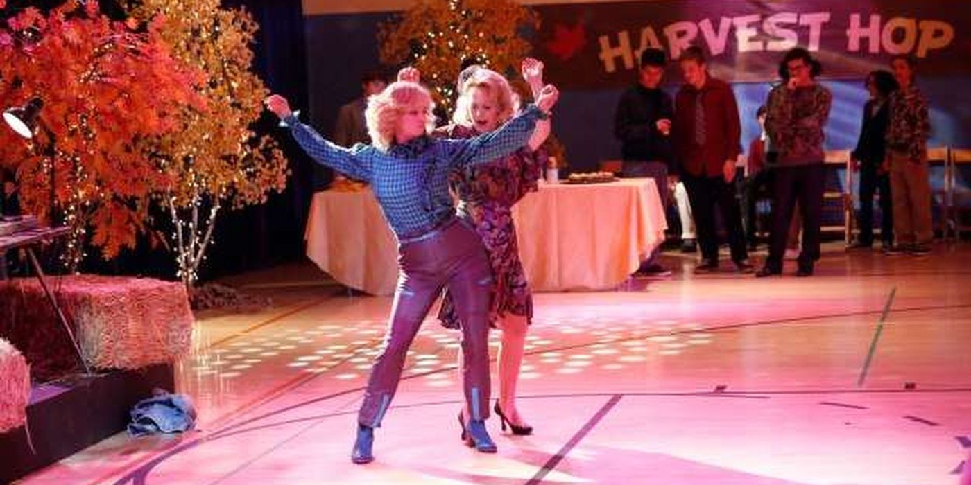 Beverly dancing with someone in the Goldbergs