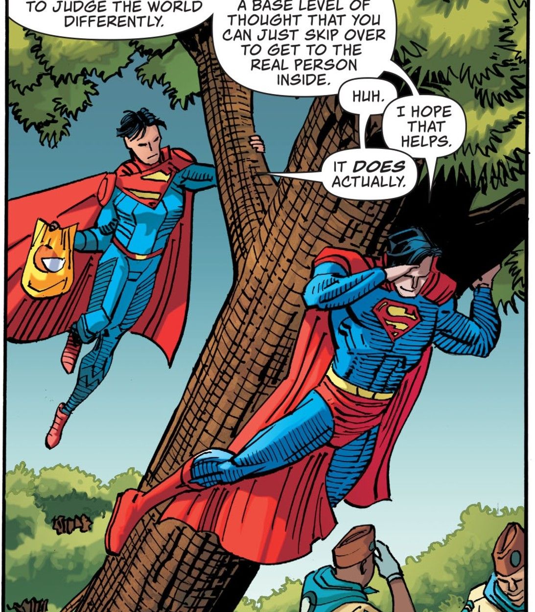 Superman and Superboy liftiing a tree in Action Comics #1028.