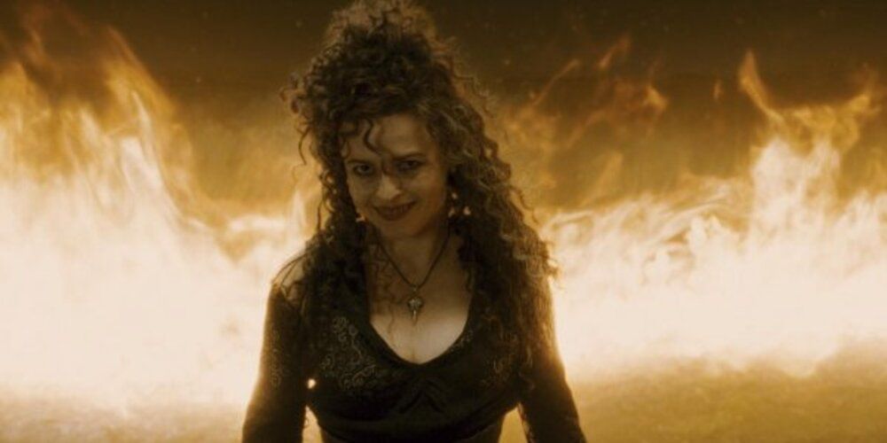 Bellatrix Lestrange smiles as the Burrow burns in the Half-Blood Prince