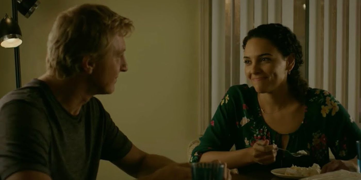Johnny and Carmen eating dinner at Cobra Kai