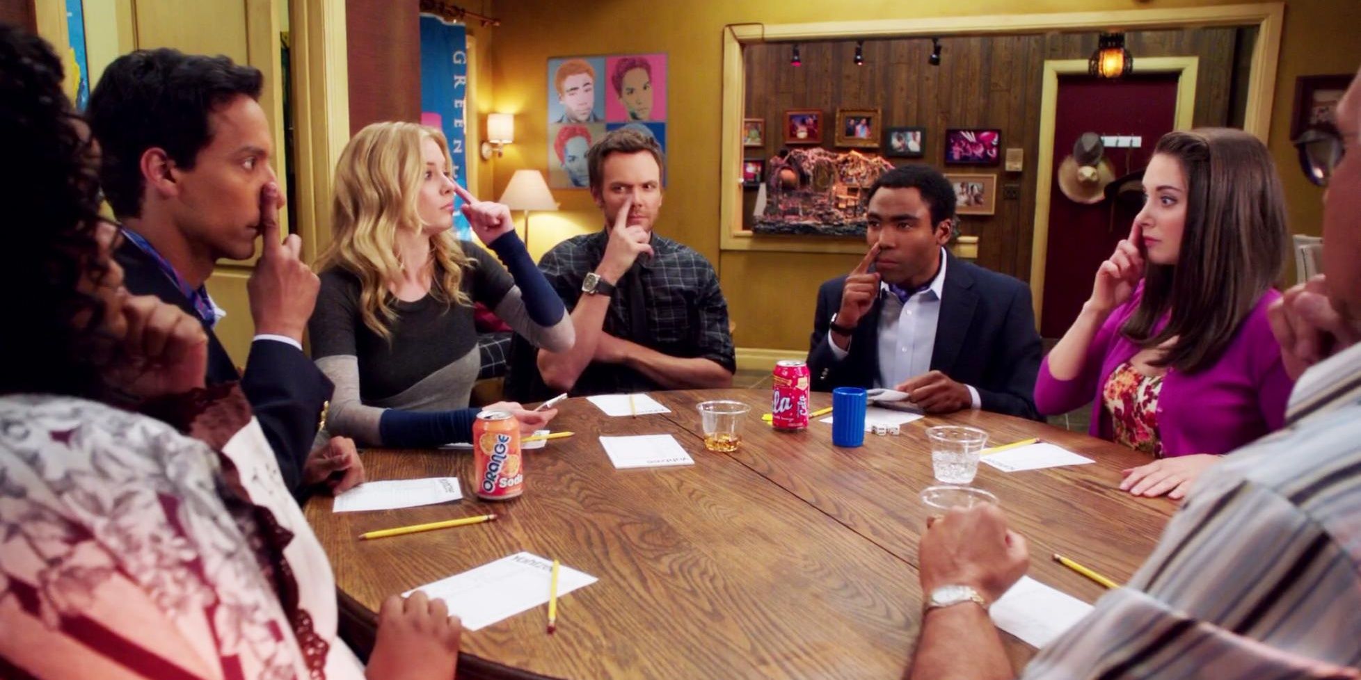 The characters from Community sitting around a table in Remedial Chaos Theory