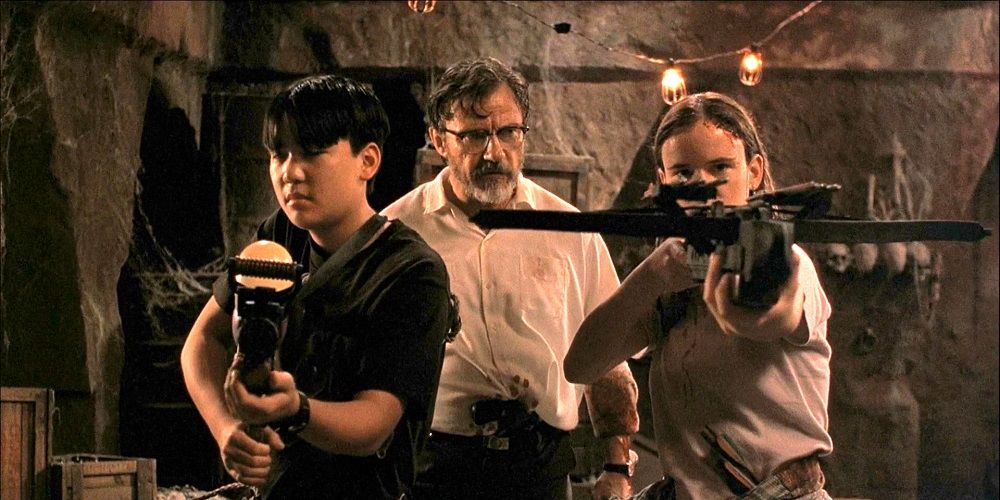 Two men and a female prepare for battle in From Dusk Till Dawn 