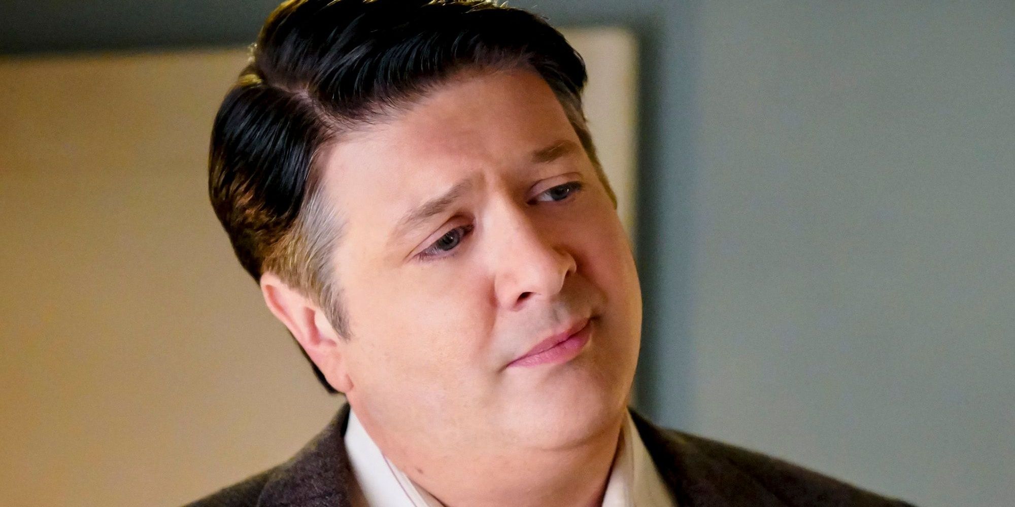 Lance Barber as George Cooper looking sad in Young Sheldon