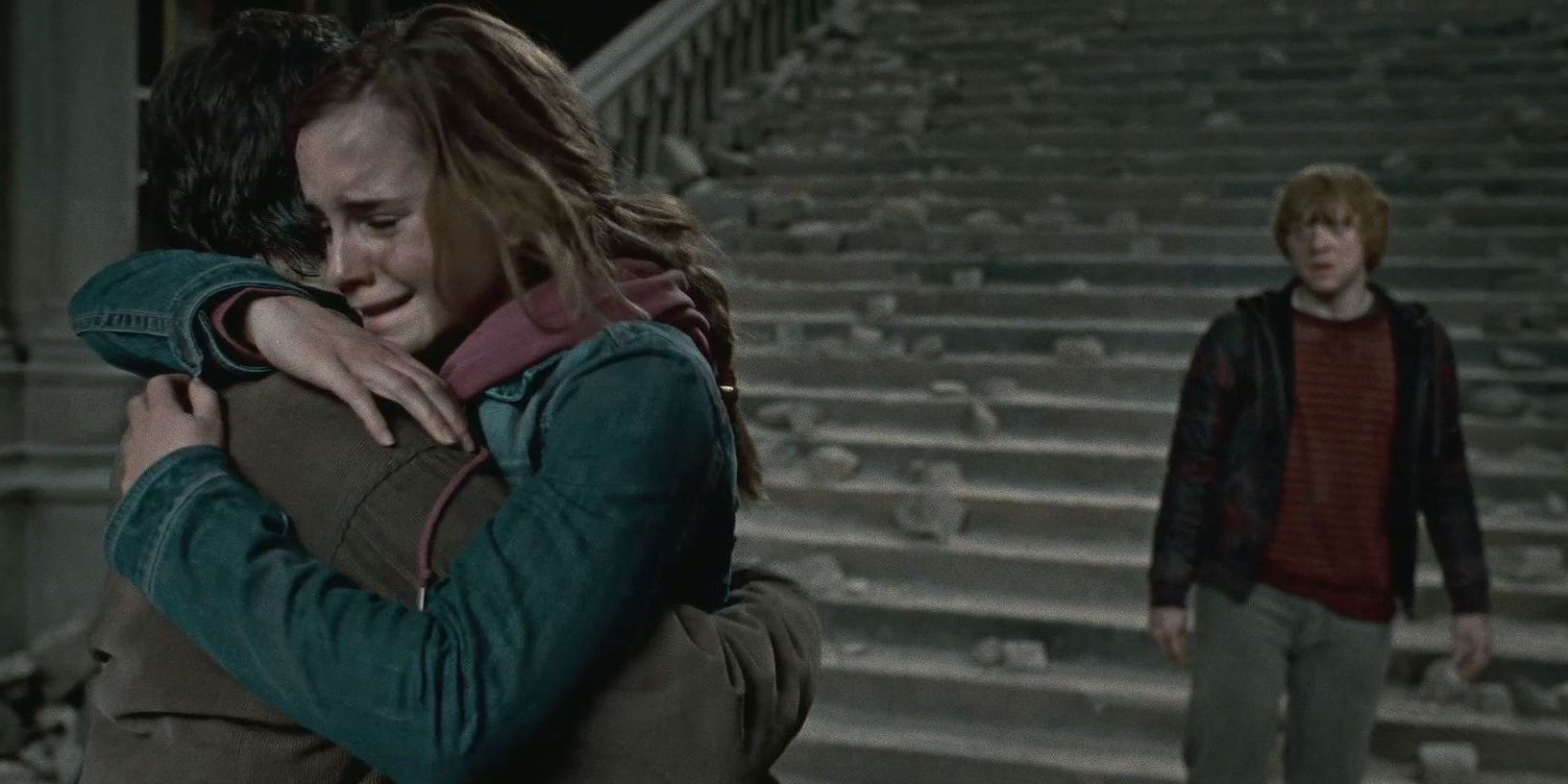 Hermione Hugs Harry In A Destroyed Hogwarts while ron Watches