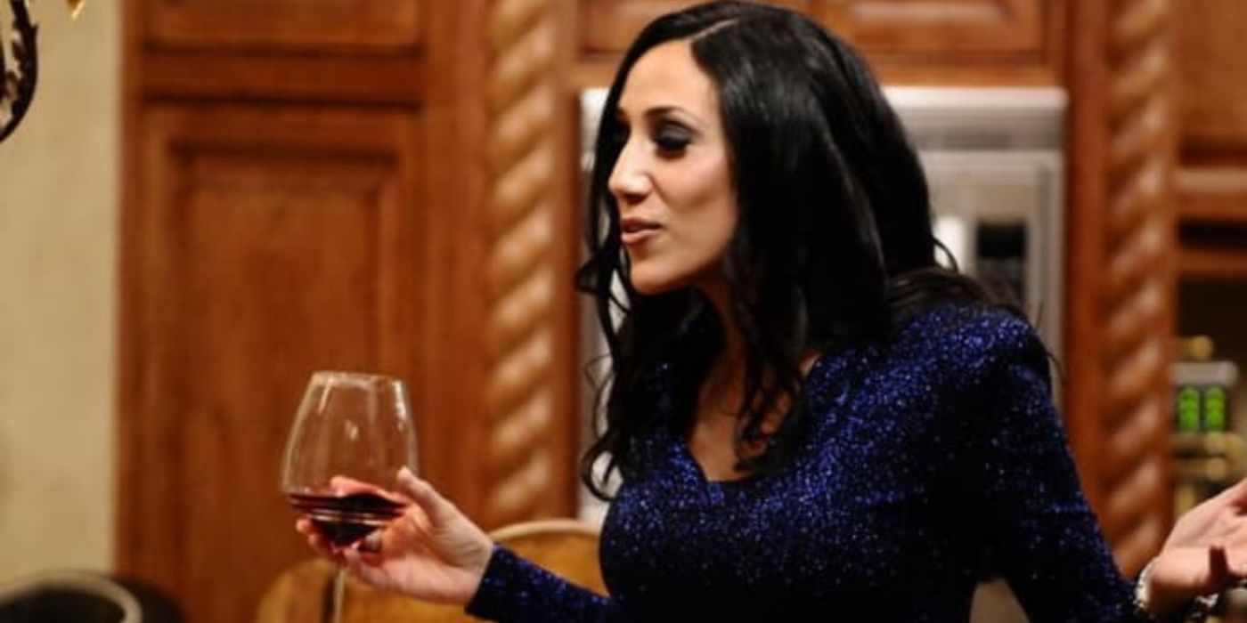 Melissa Gorga holding a glass of wine on RHONJ