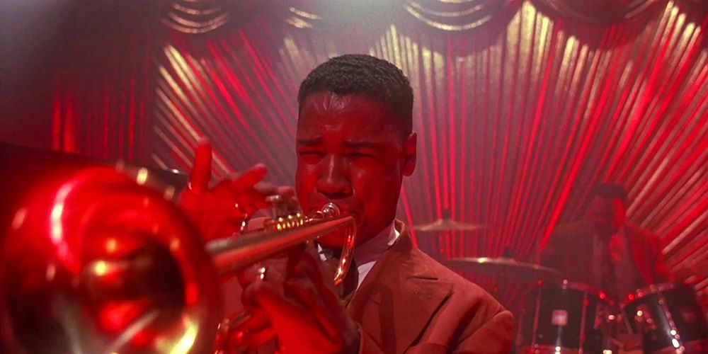 Denzel Washington tocando trompete em Mo Better Blues 1990
