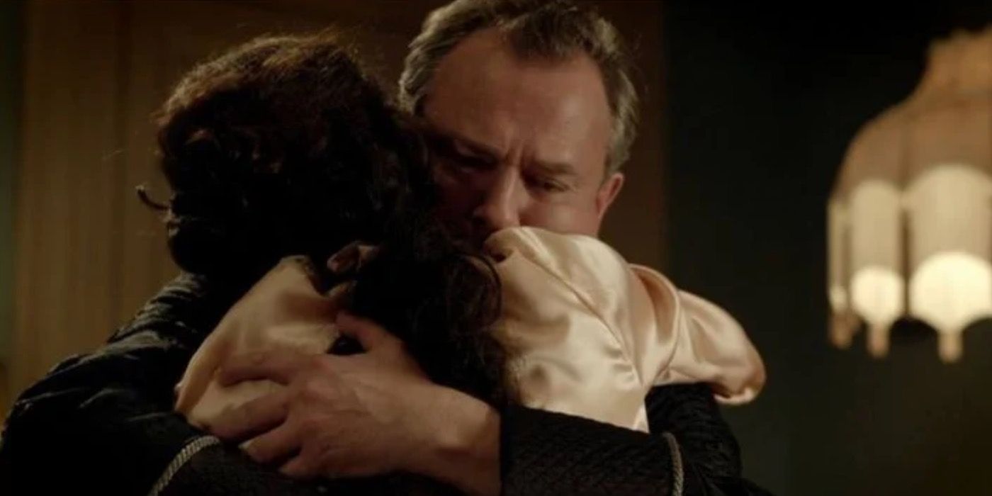 Cora and Robert hugging in Downton Abbey
