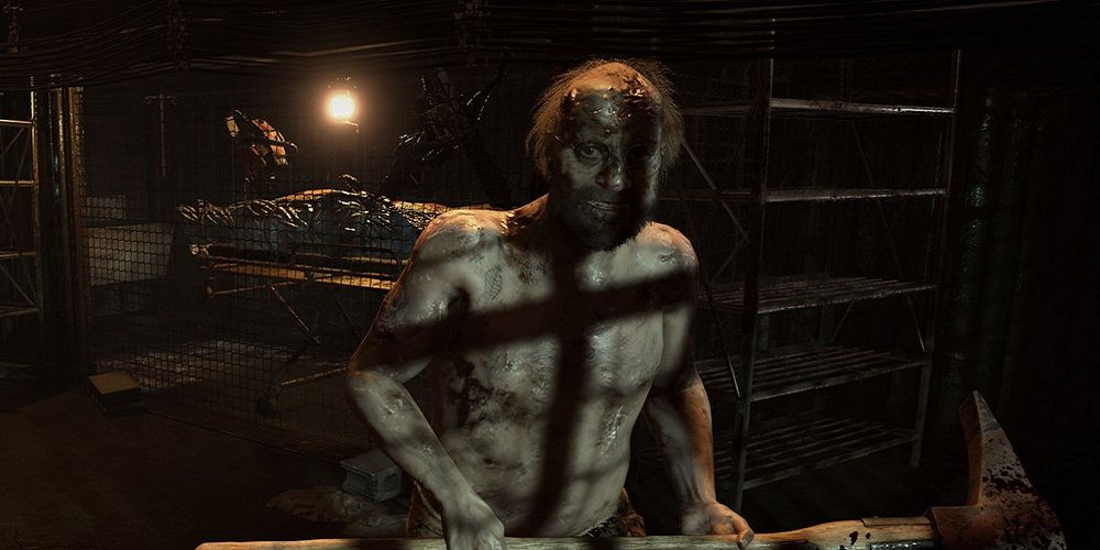 Jack Baker holds an axe in Resident Evil 7: Biohazard.
