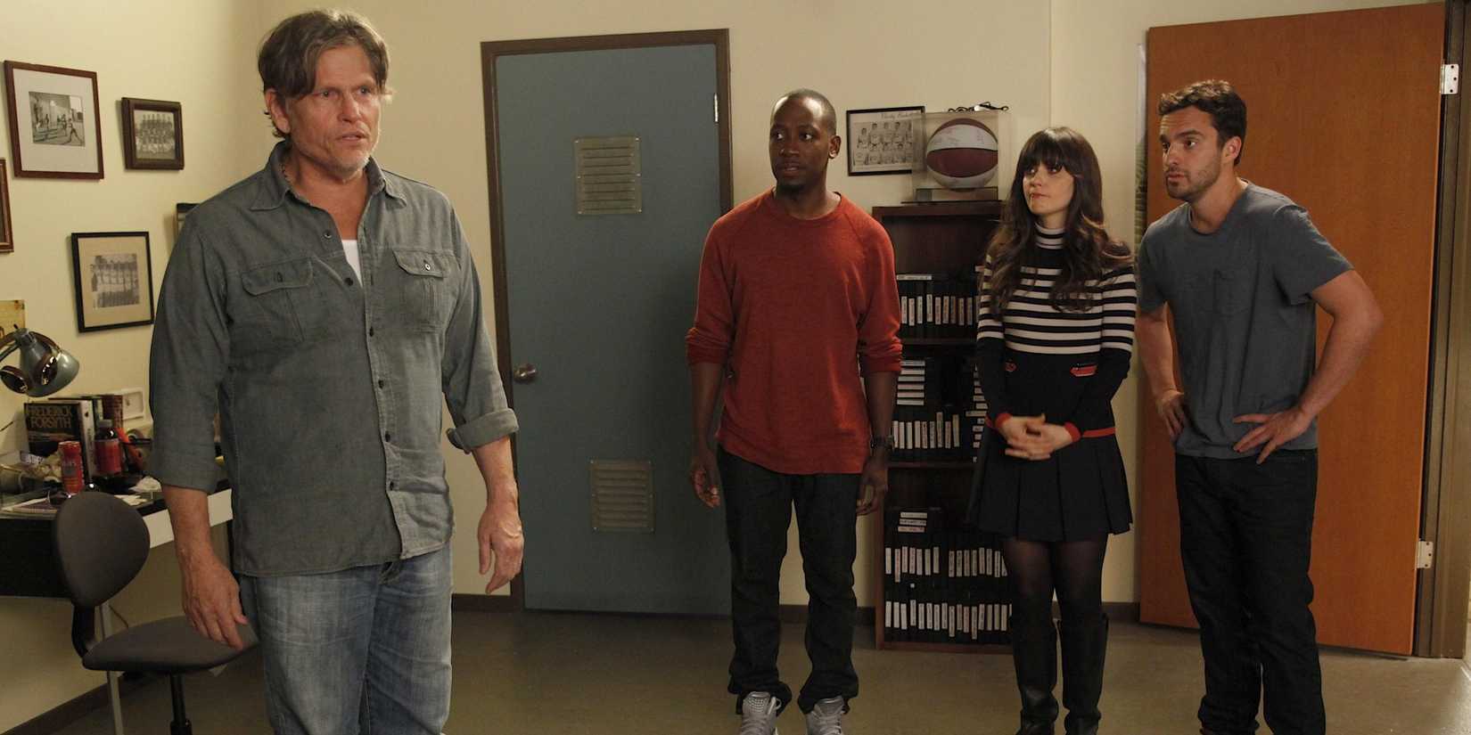 The cast staring at Remy the landlord in New Girl