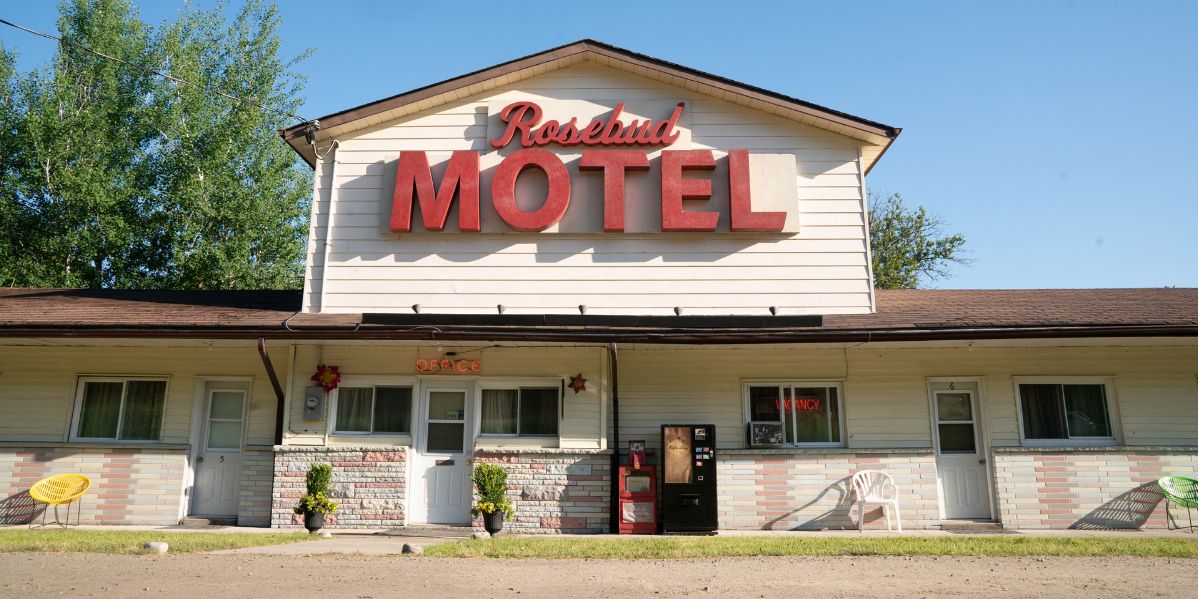 Exterior shot of the Rosebud Motel on a sunny day