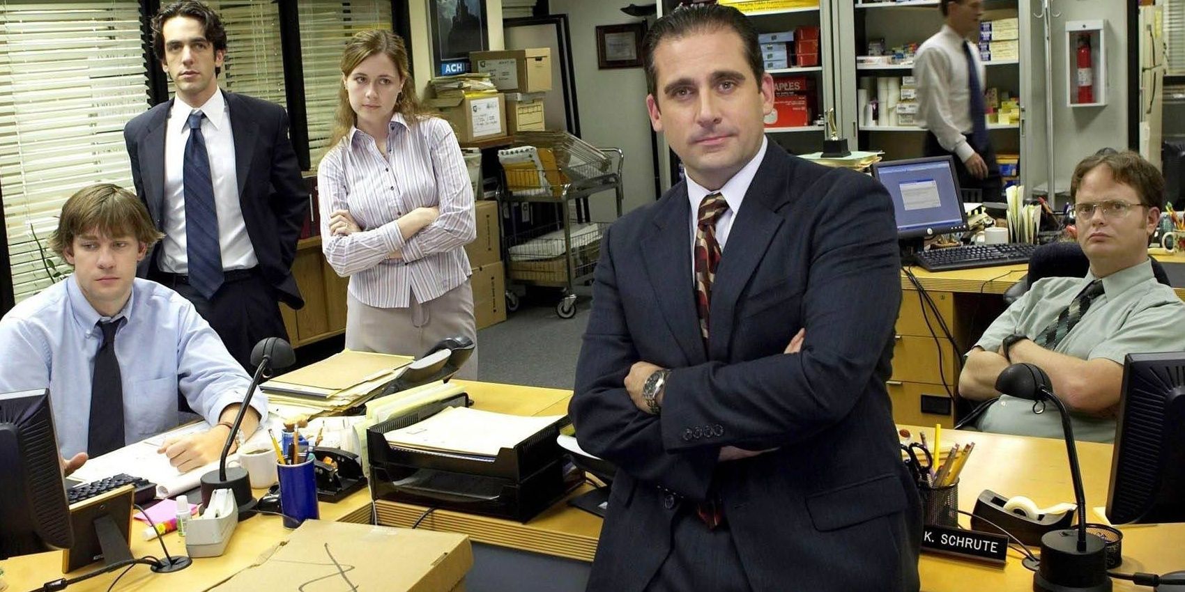 michael scott standing in front of the office