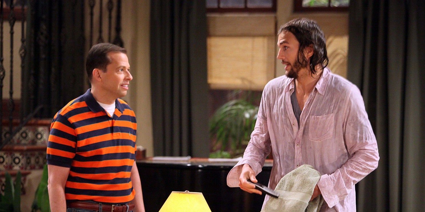 Walden (Ashton Kutcher) is soaking wet as he talks to Alan (Jon Cryer) in Two and a Half Men