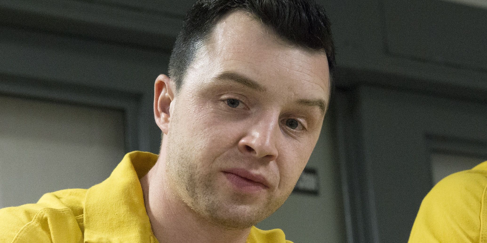 Mickey looking angry in prison in Shameless