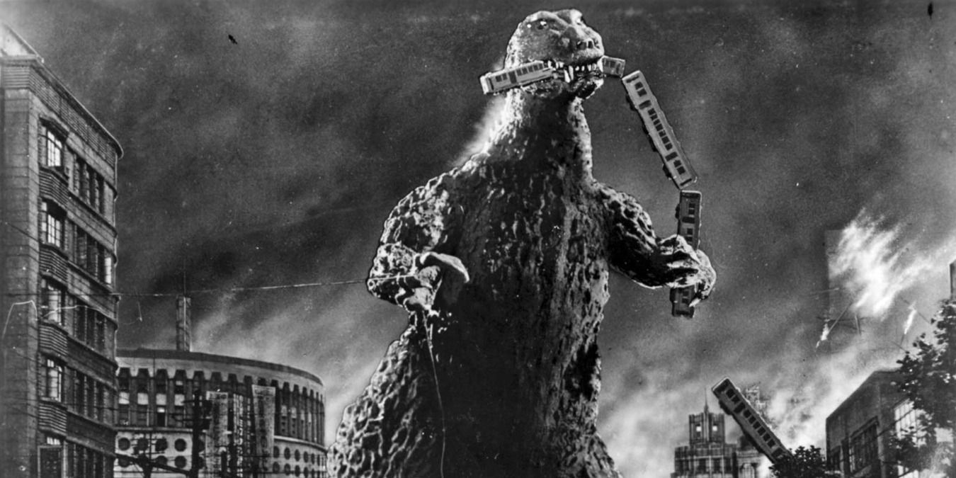 Godzilla holding train in its mouth in the 1954 movie
