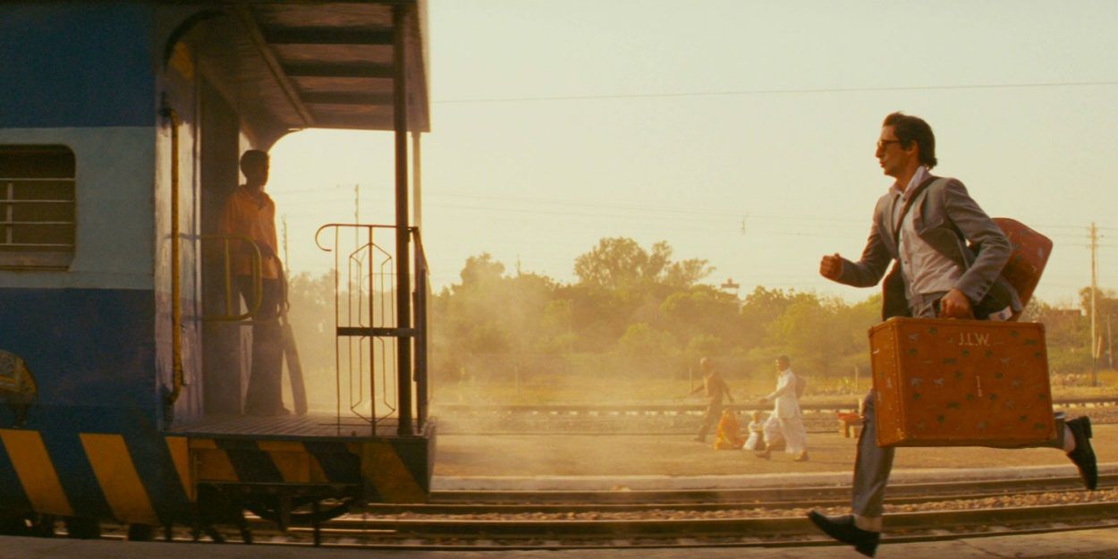 Adrien Brody runs to catch the train in The Darjeeling Limited
