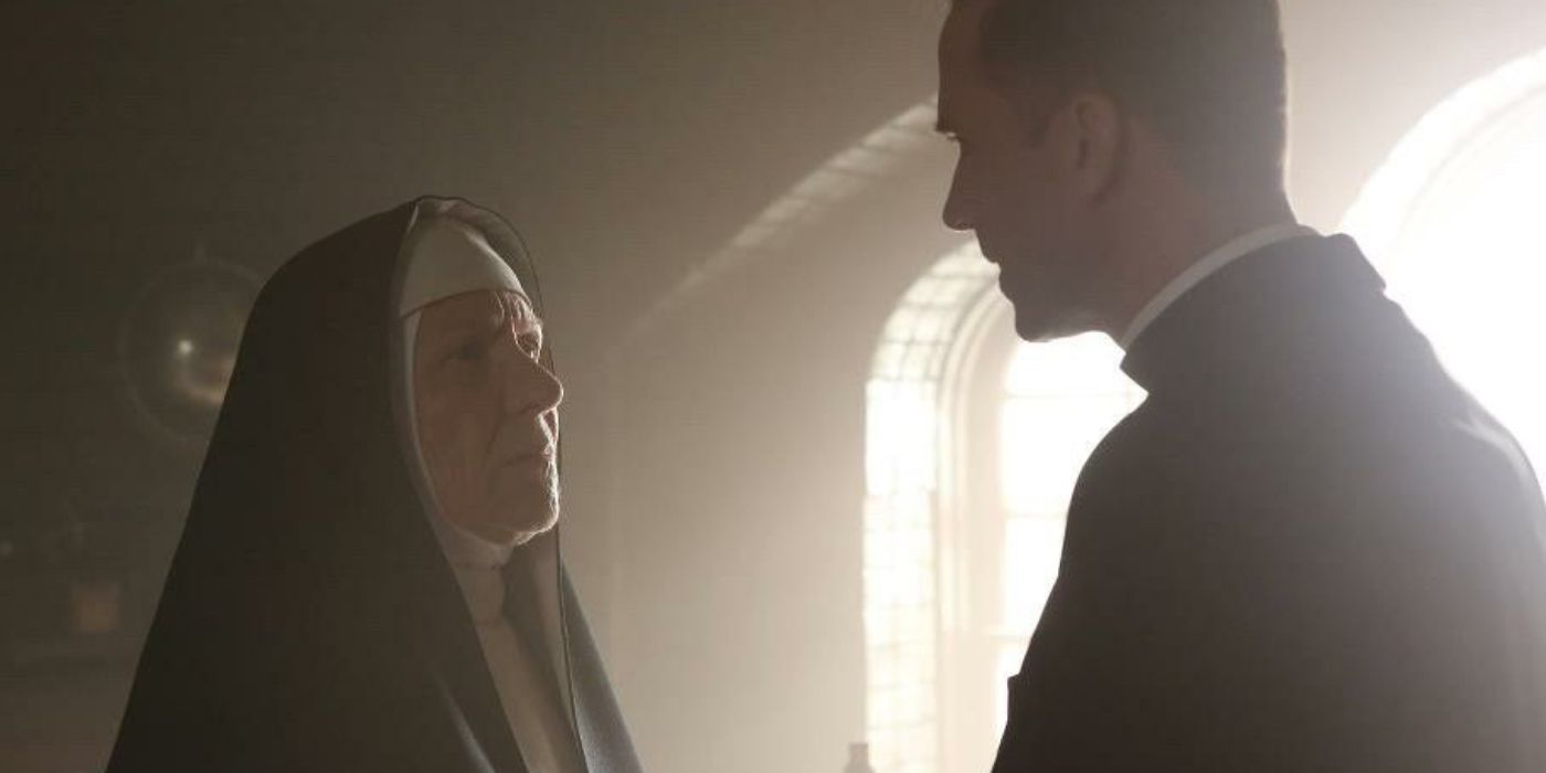 Mother Superior talks to someone in American Horror Story Asylum