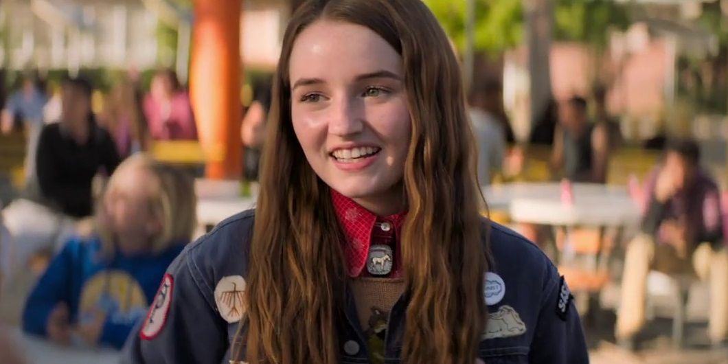 Amy smiling widely in Booksmart