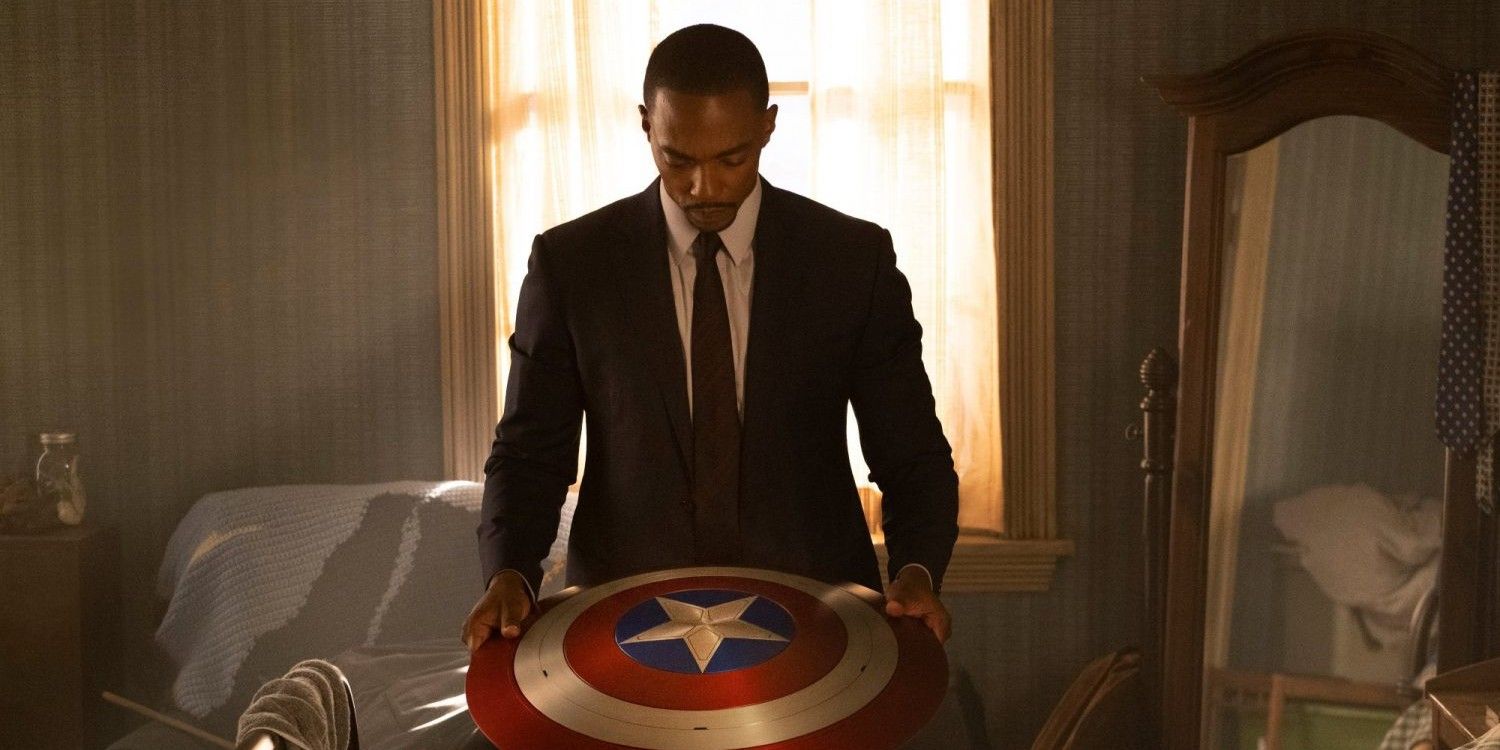 Sam Wilson holds the Captain America shield in The Falcon and the Winter Soldier