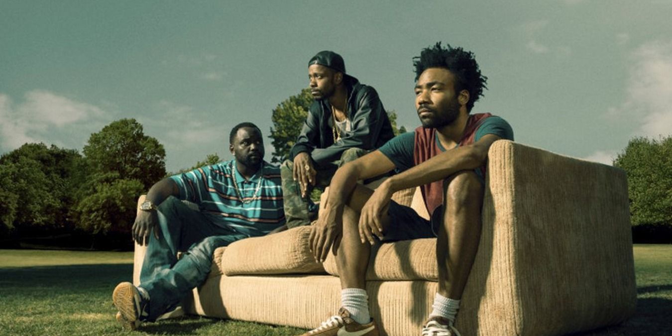 Donald Glover Brian Tyree Henry Lakeith Stanfield sitting on couch outside