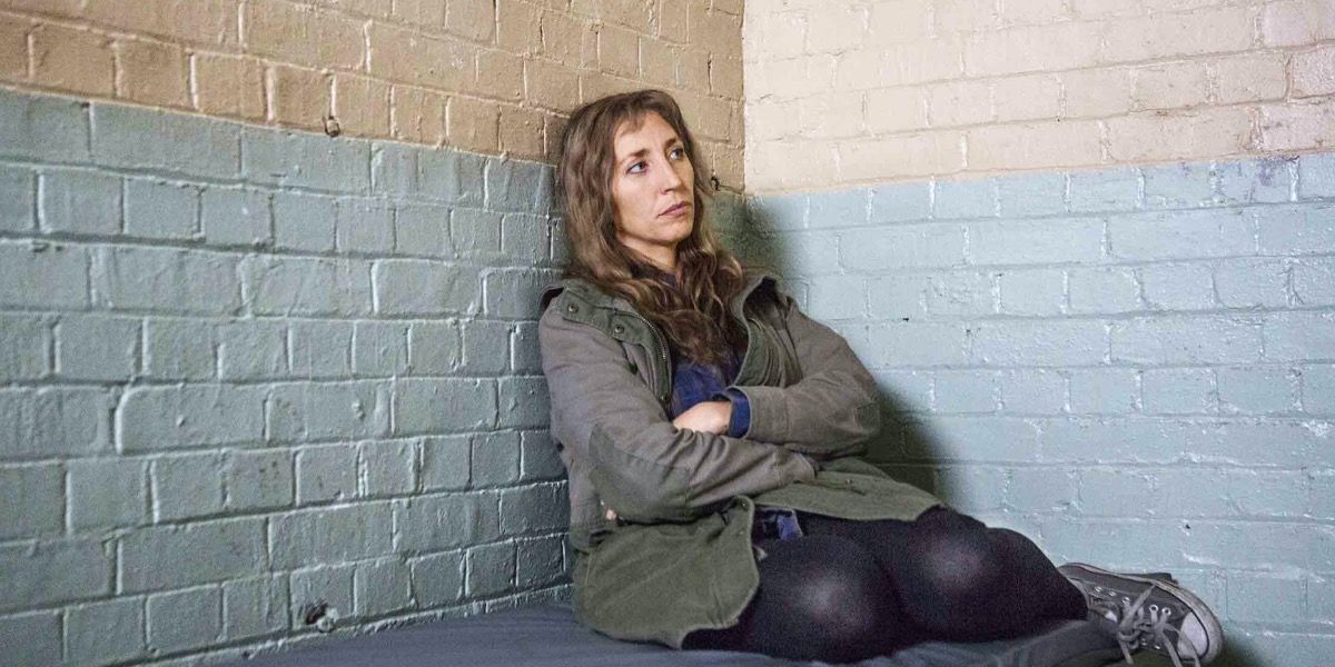 Daisy Haggard sitting in the corner in Back To Life