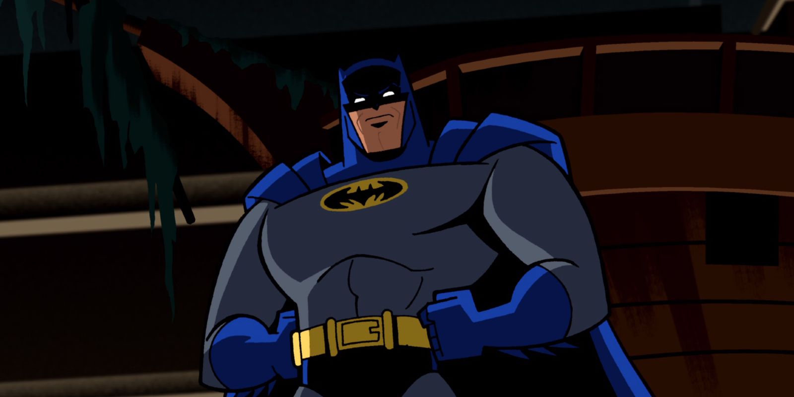 Batman with his hands on his hips in Batman The Brave And The Bold