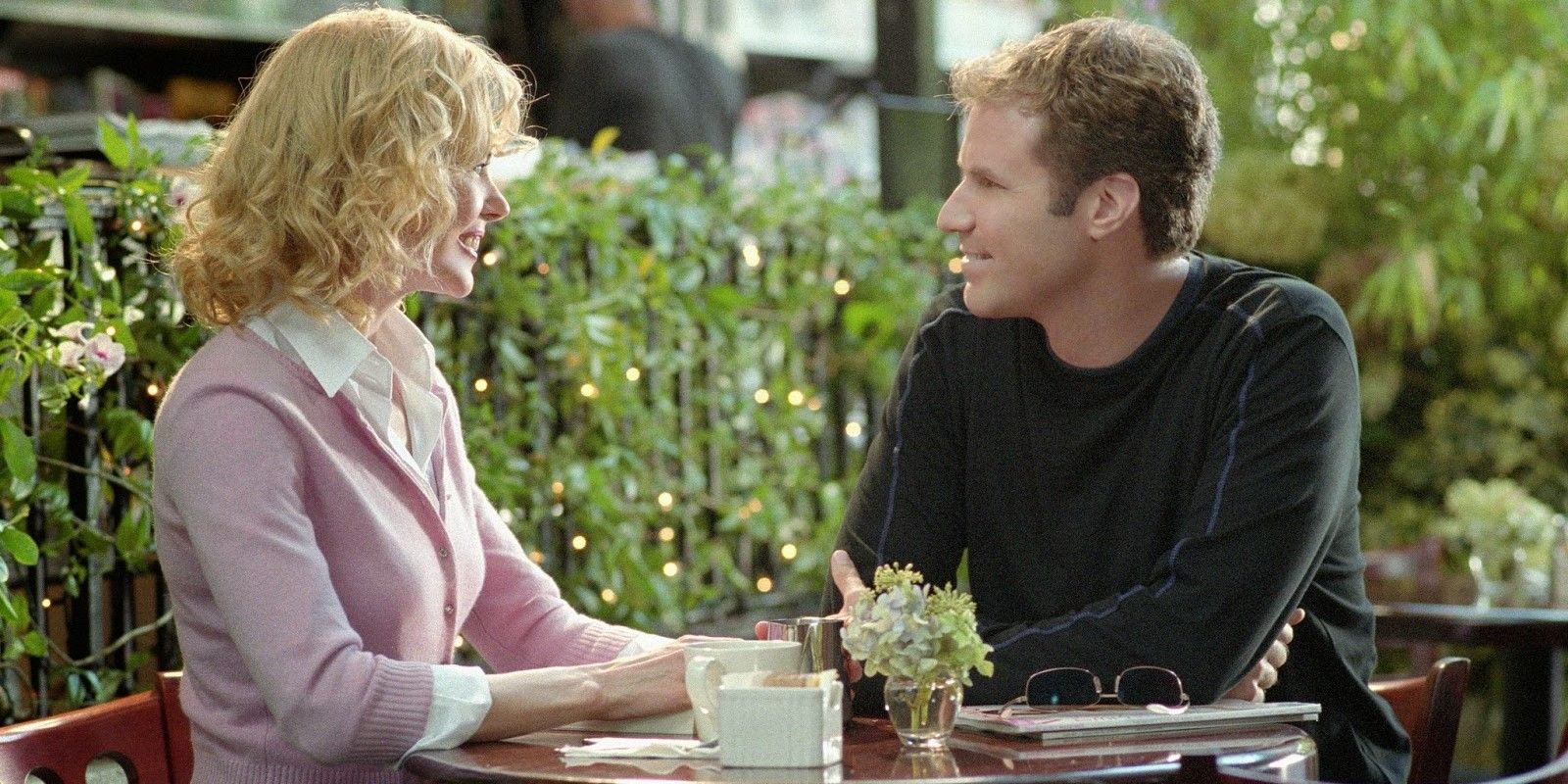 Nicole Kidman and Will Ferrell sitting down in character in Bewitched