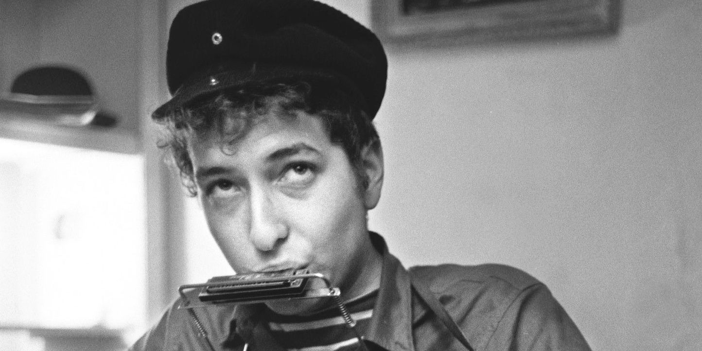 Bob Dylan playing the harmonica